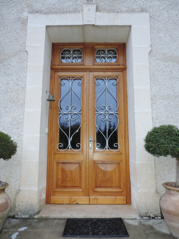 Porte d'entrée châtaignier pour demeure de caractère